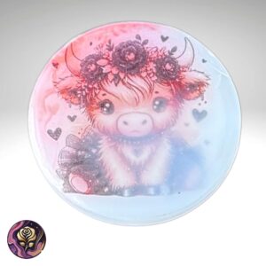 Cute cow resin phone grip with pink and blue background and flower crown, handmade stick-on holder for phones and tablets