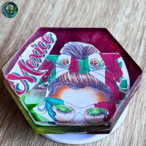 Handmade resin phone grip with vibrant red, white, and green Mexican flag-inspired design in an expandable pop socket style.