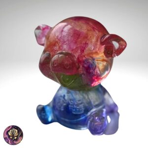 Handmade rainbow resin pig figurine with glossy finish and glitter accents, ideal for animal lovers and farmhouse decor