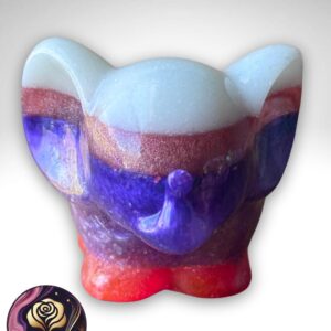 Handmade multicolor resin elephant candle holder with pink and purple glitter accents, doubles as a planter or sponge organizer