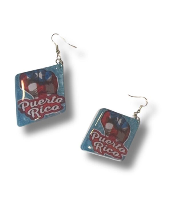 Handmade Puerto Rico Pride Resin Earrings featuring fist design and flag colors on light blue glitter background