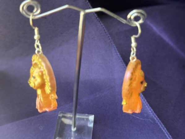 Close-up of Lion Earrings with Hand-Painted Details and Gold Accents