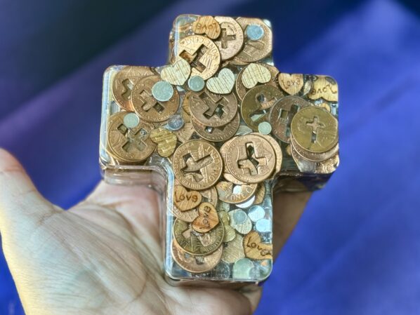 Handmade religious resin keepsake box in cross shape with copper accents