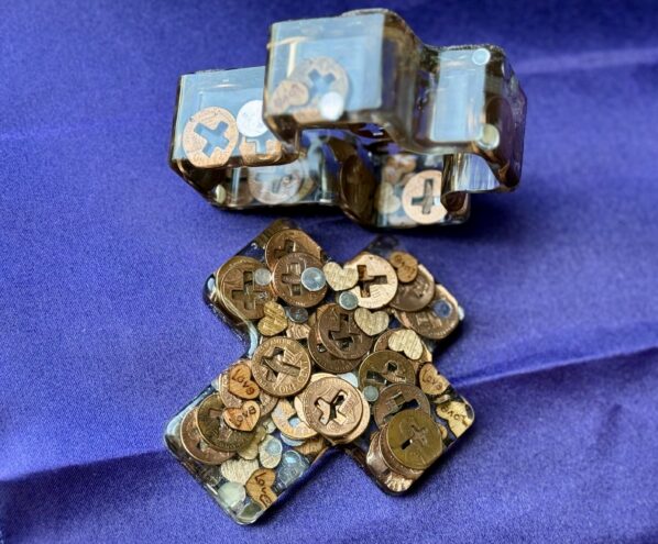 Handmade religious resin keepsake box in cross shape with copper accents